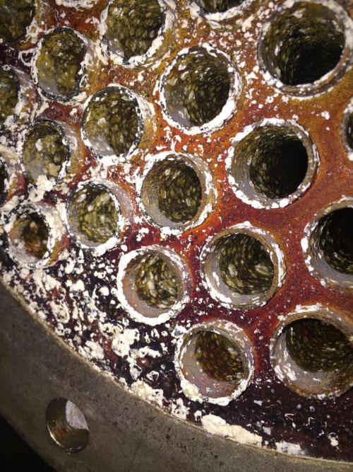 Fig 1 Severe fouling of water cooled condenser tubes.